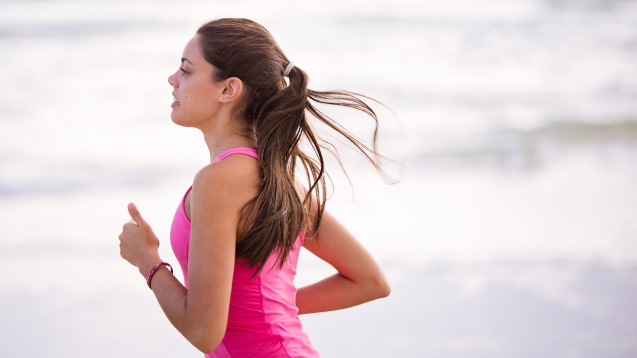 woman pink shirt running