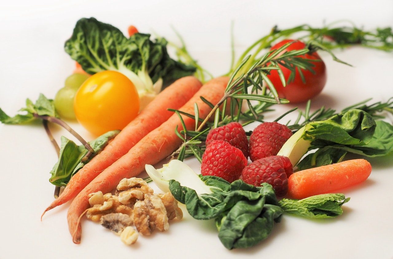 closeup vegetables and nuts white background