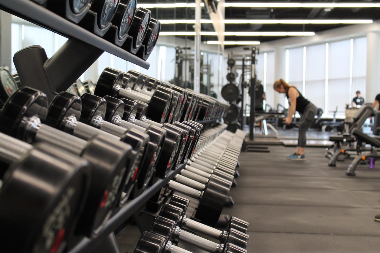 dumbbells losing weight in the gym