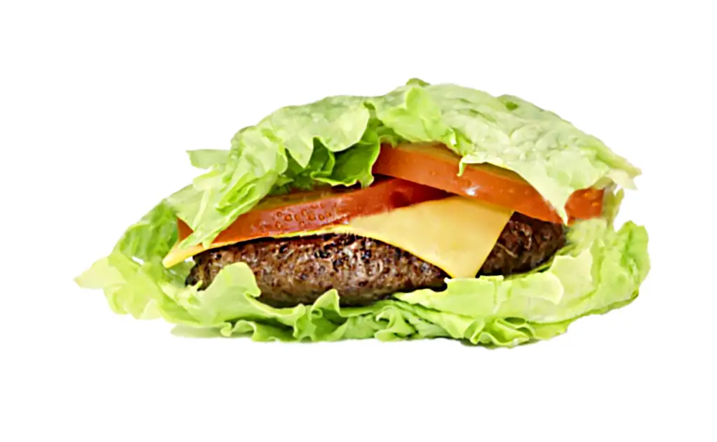 Low-carb hamburger with lettuce, tomato, and cheese in a lettuce wrap.